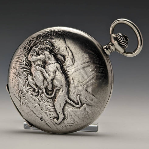 Around 1910 Antique Ulysse Nardin pocket watch Wild beast engraving Silver hunter case Works well